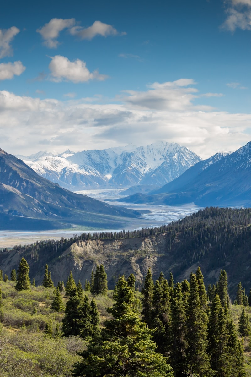Snow-capped alpine mountain ridge under clear sky