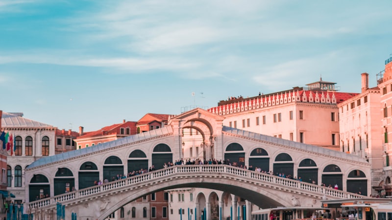 Gondolas on a canal in a historic European city